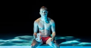 Finn Cole in Red Speedo, © Johan Persson