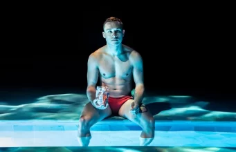 Finn Cole in Red Speedo, © Johan Persson