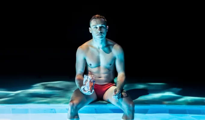 Parker Lapaine on Red Speedo at the Orange Tree Theatre Finn Cole in Red Speedo, © Johan Persson